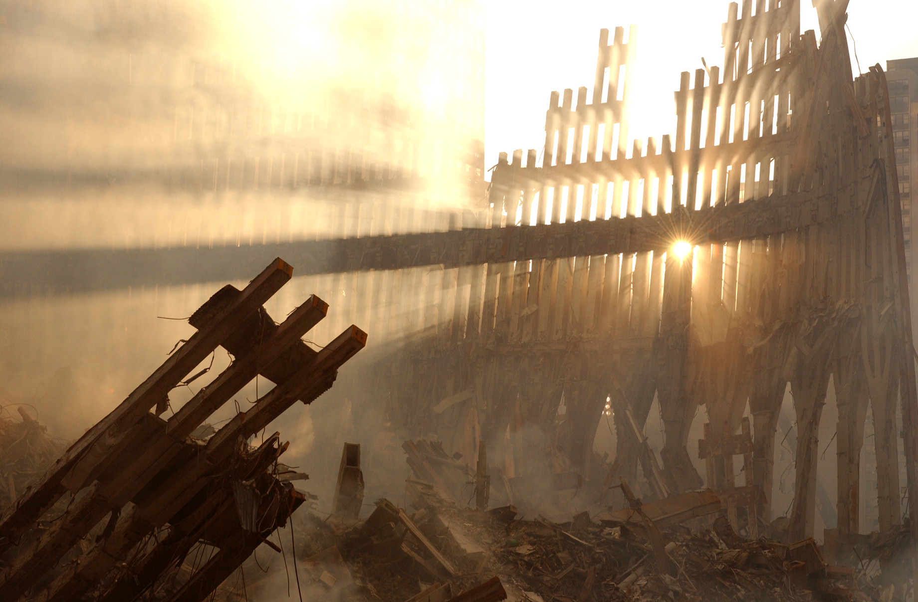 World Trade Center debris at dusk with light filtering through