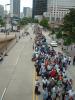 Residents are bringing their belongings and lining up to get into the Superdome which has been opened as a hurricane shelter in advance of hurricane Katrina. Most residents have evacuated the city and those left behind do not have transportation or have special needs. Marty Bahamonde/FEMA 